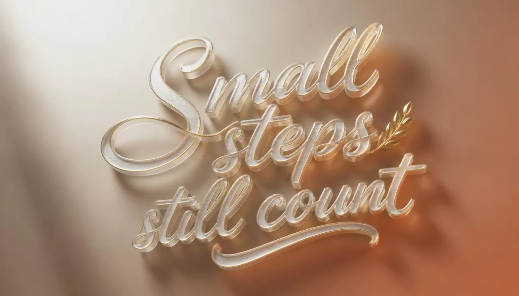 3D floating gold and glass cursive text saying 'Small steps still count', heading image for motivational cursive quotes